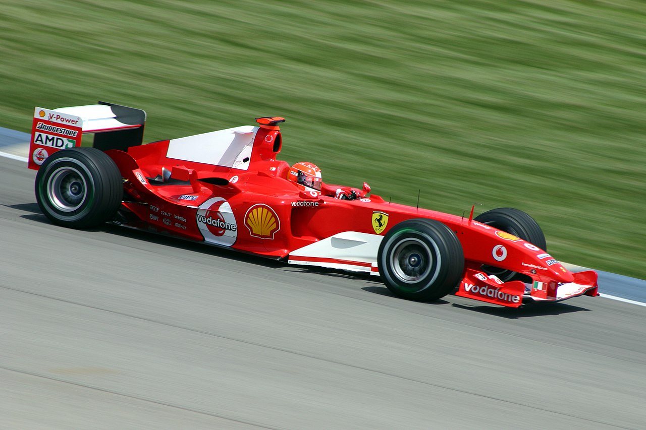 1280px-Michael_Schumacher_Ferrari_2004.jpg